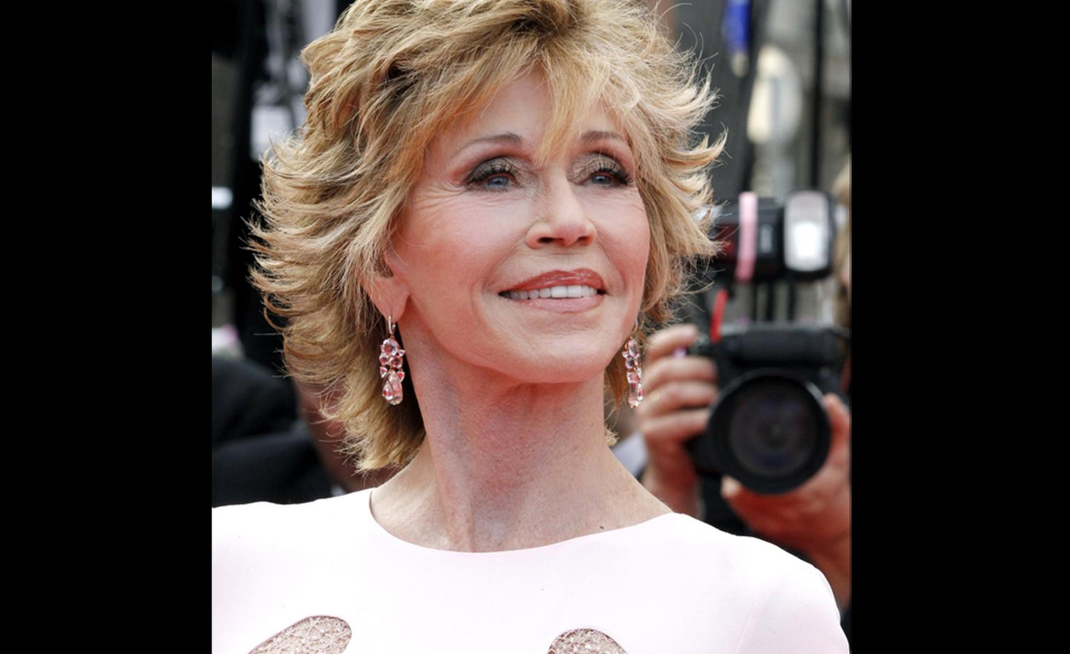 Jane Fonda wear Chopard tourmaline, spinel, morganite and diamond earrings on the red carpet at Cannes Film Festival 2011.