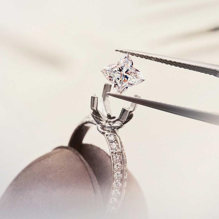 Louis Vuitton Monogram Star diamond being set in an engagement ring