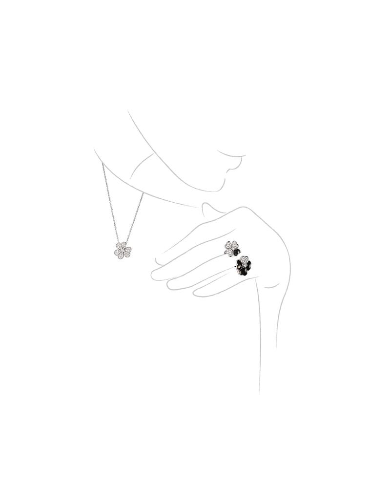 Van Cleef & Arpels Cosmos Between the Finger onyx and diamond ring and Cosmos diamond necklace.