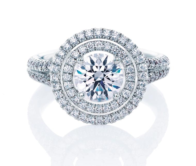 De Beers Aura Double Halo ring in platinum, set with a central round, brilliant-cut diamond and micro pavé diamonds (from: £7,650).