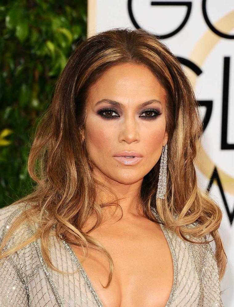Jennifer Lopez was daring as always in plunging, sequined